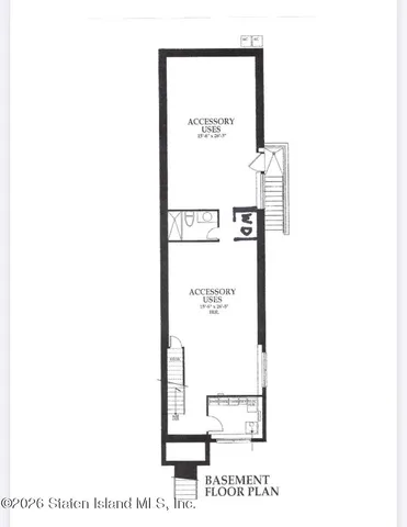 a picture of a bench in front of a wall