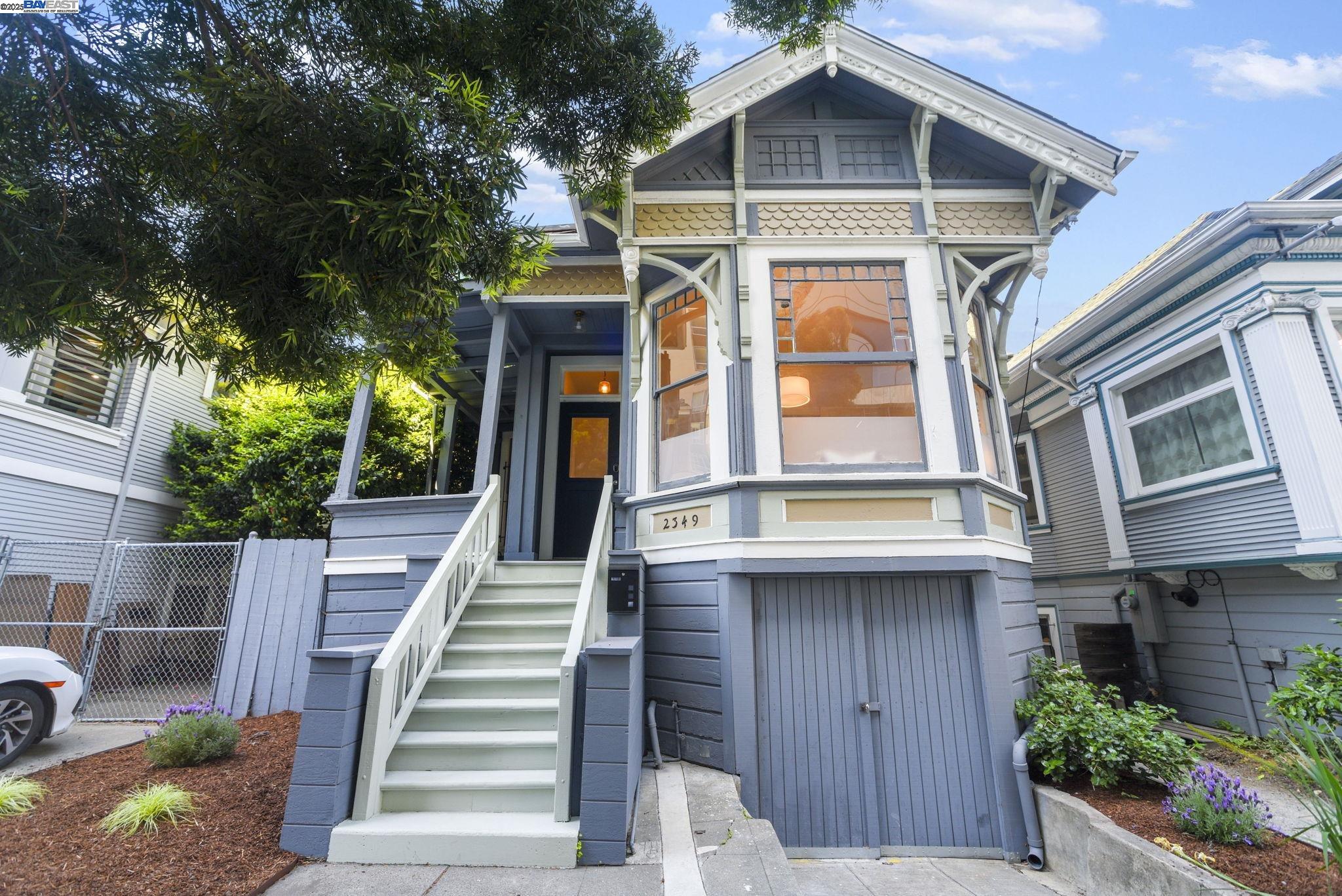 2349 Waverly Street Oakland, CA 94612 - Photo 1 of 1 a front view of a house with a yard