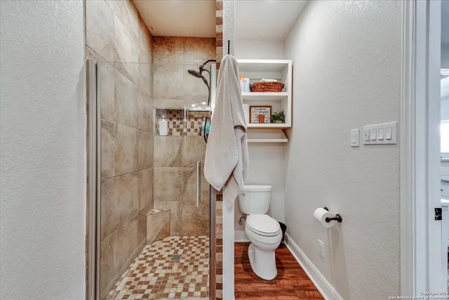 a bedroom with furniture and window