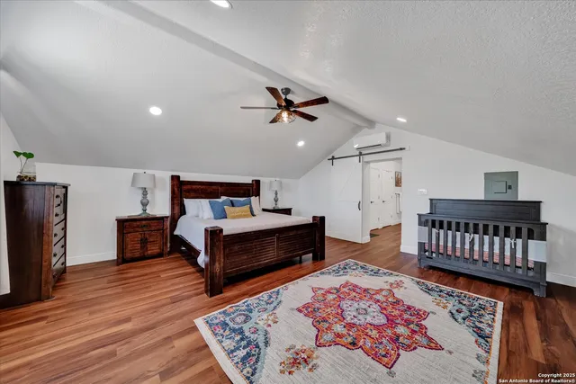 a bed room with a bed and dresser