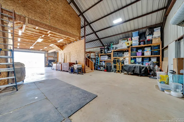 a view of parking garage with cars