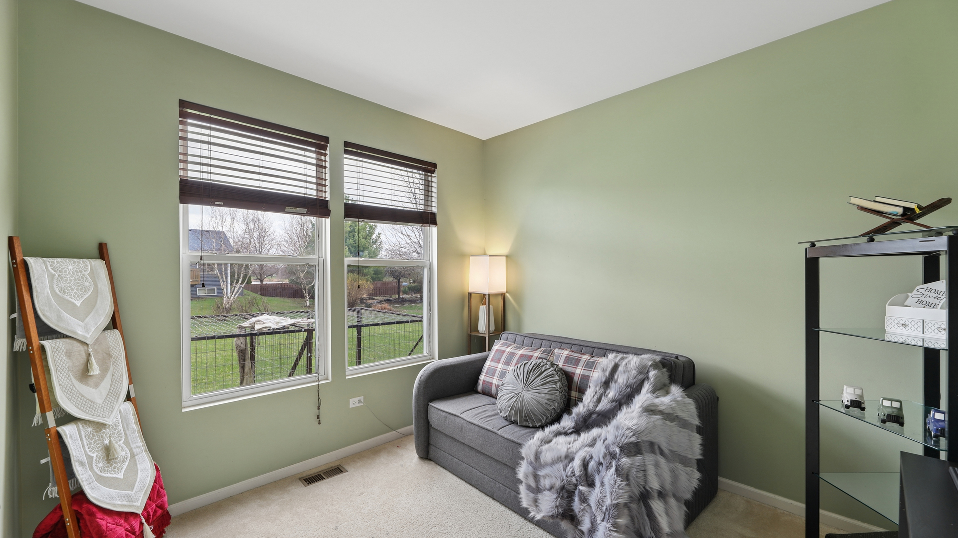 210 Honeysuckle Street Bolingbrook, IL 60490 - Photo 6 of 37 a living room with furniture and a window