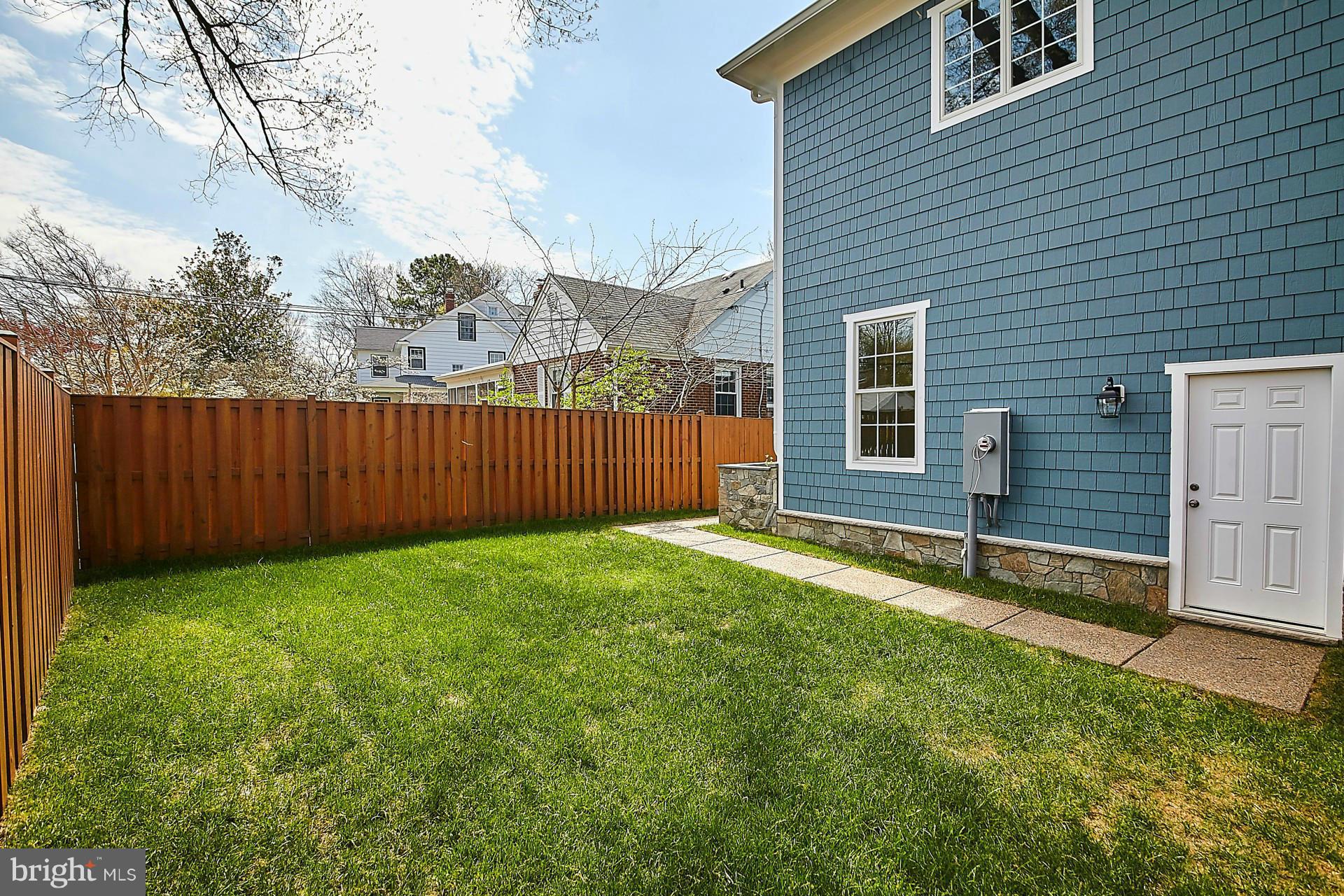 6000 27th Street North Arlington, VA 22207 - Photo 30 of 30 a view of a backyard with a garden and deck