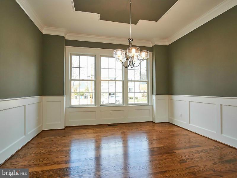 6000 27th Street North Arlington, VA 22207 - Photo 4 of 30 wooden floor in an empty room with a window