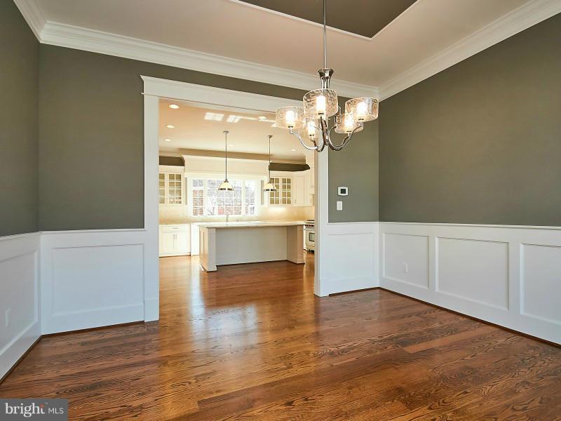 6000 27th Street North Arlington, VA 22207 - Photo 5 of 30 a view of a kitchen with wooden floor and a kitchen