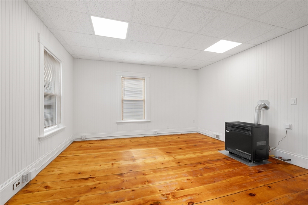 75 Gage Street, Unit 3 Worcester, MA 01605 - Photo 5 of 10 a view of empty room with wooden floor