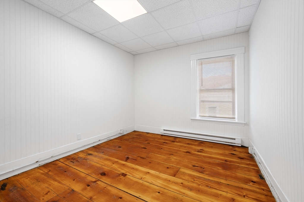 75 Gage Street, Unit 3 Worcester, MA 01605 - Photo 7 of 10 an empty room with window