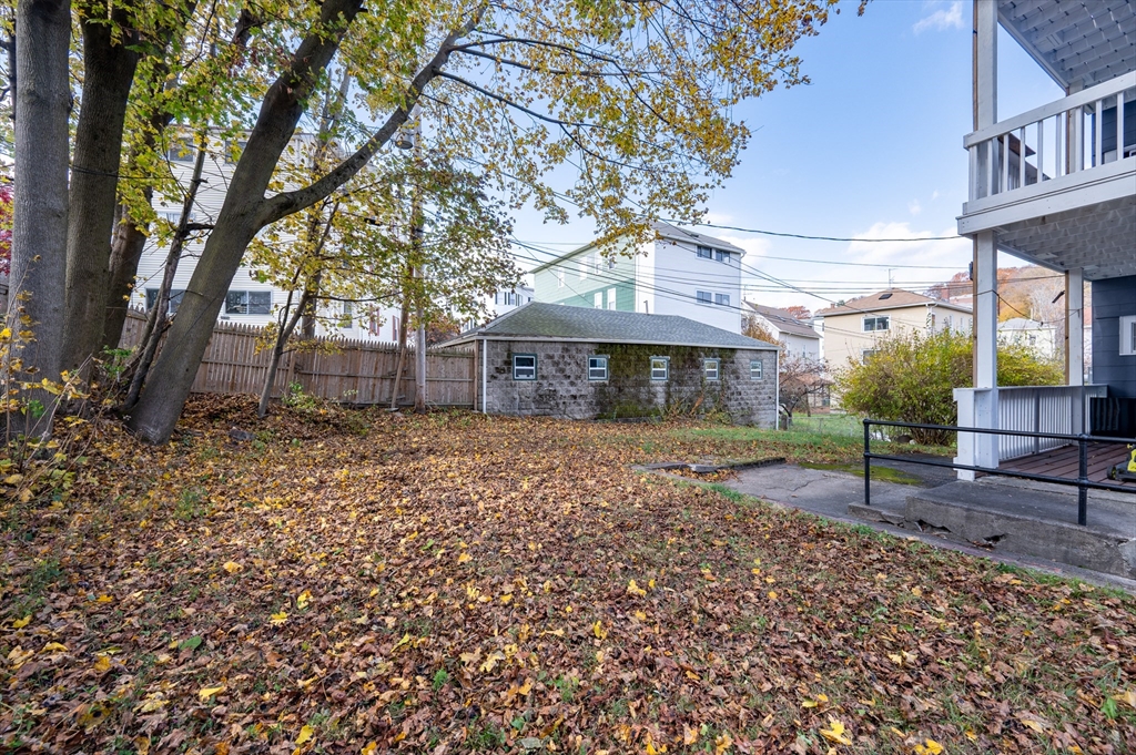 75 Gage Street, Unit 3 Worcester, MA 01605 - Photo 10 of 10 a front view of a house with a garden