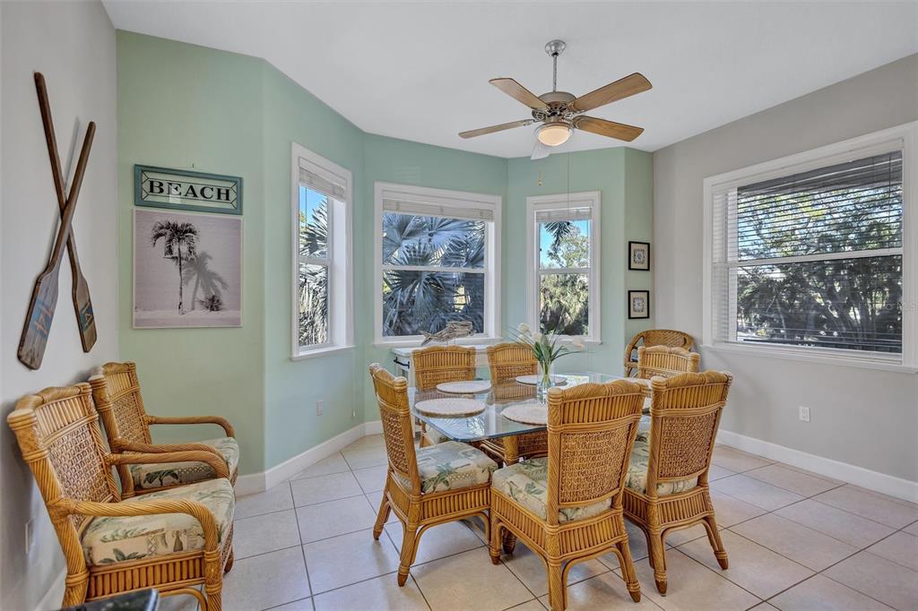436 Canal Road, Unit A Sarasota, FL 34242 - Photo 31 of 94 a dining room with furniture and window