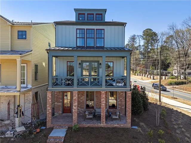 a view of a building with a porch