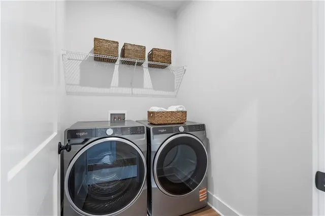 a utility room with dryer and washer