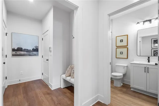a view of bathroom with toilet sink and tub