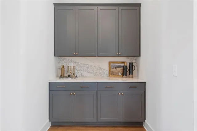 a view of cabinets with wooden floor