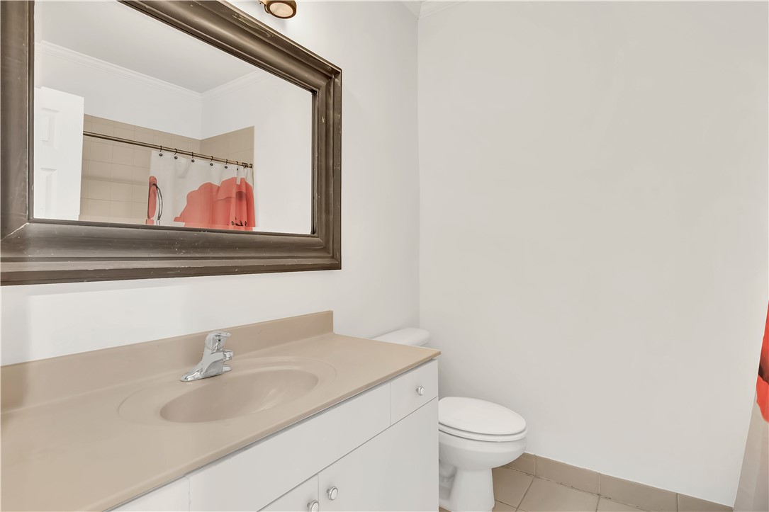 2541 Stockbridge Square Southwest Vero Beach, FL 32962 - Photo 15 of 33 a bathroom with a sink and a mirror