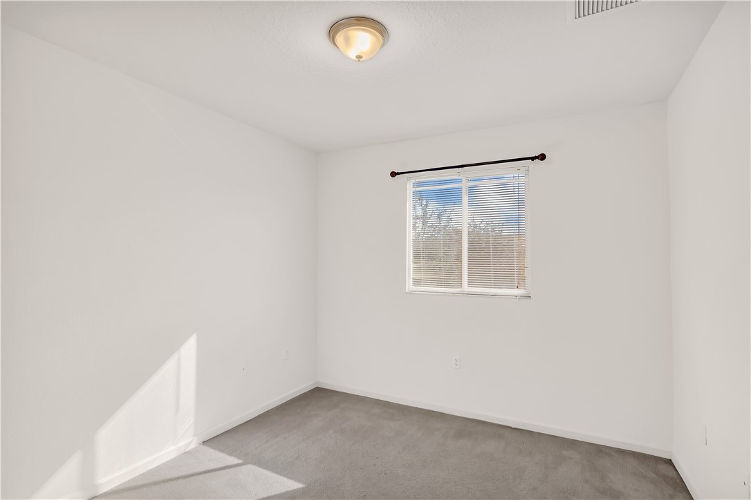 2541 Stockbridge Square Southwest Vero Beach, FL 32962 - Photo 23 of 33 an empty room with a window