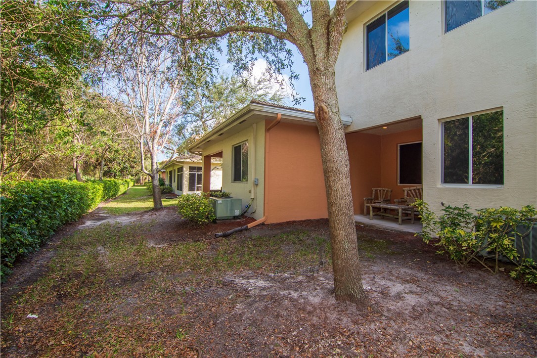 2541 Stockbridge Square Southwest Vero Beach, FL 32962 - Photo 26 of 33 a view of a house with a yard