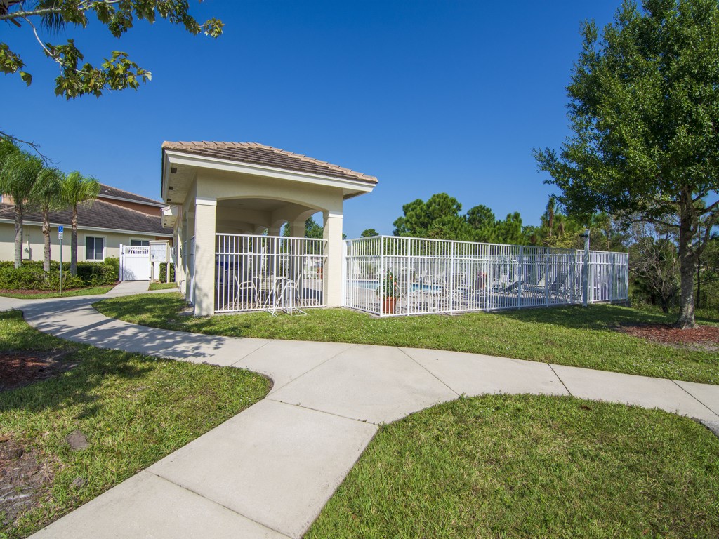 2541 Stockbridge Square Southwest Vero Beach, FL 32962 - Photo 30 of 33 a view of a house with a yard