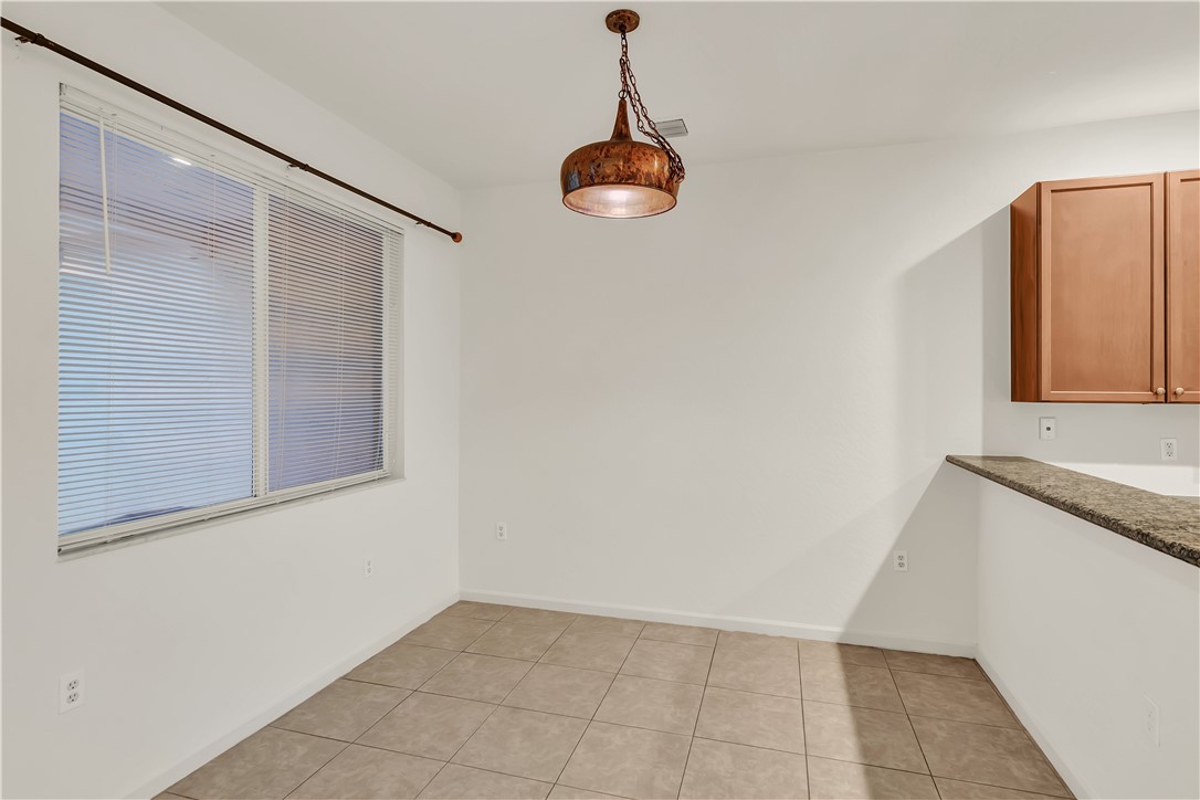 2541 Stockbridge Square Southwest Vero Beach, FL 32962 - Photo 10 of 33 a view of a room with an empty space and a window