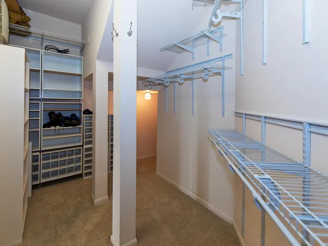 a kitchen with stainless steel appliances granite countertop a refrigerator stove a sink and dishwasher