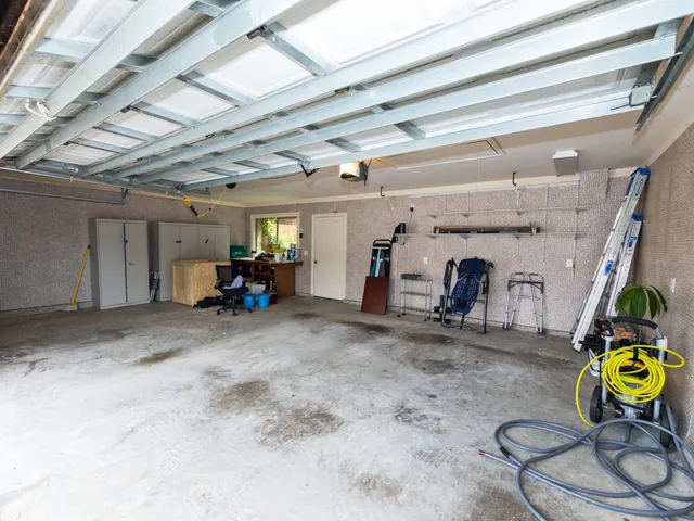 a front view of a house with garage