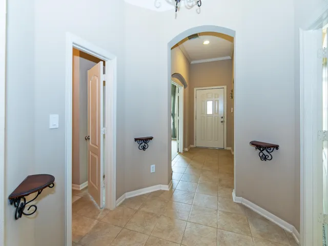 wooden floor and window in an empty room