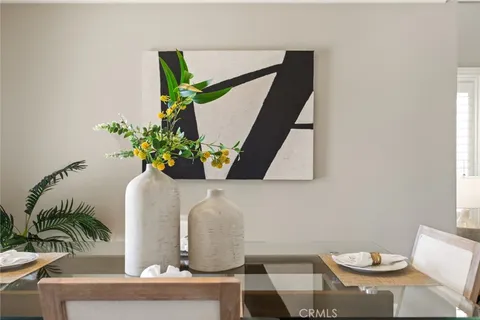 a vase of flowers sitting on a table