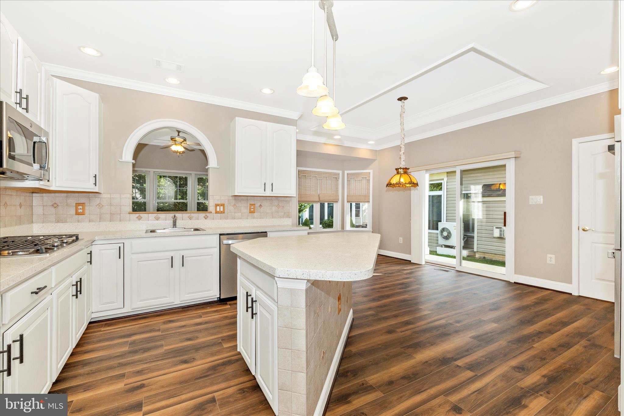 2654 Brook Valley Road Frederick, MD 21701 - Photo 11 of 64 a large kitchen with a lot of counter space and wooden floor