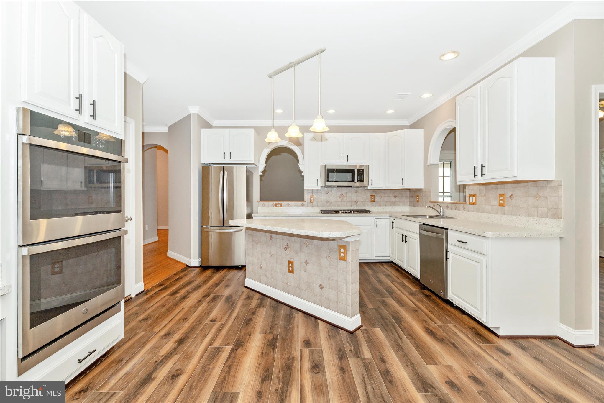 2654 Brook Valley Road Frederick, MD 21701 - Photo 13 of 64 a kitchen with a sink stainless steel appliances and cabinets