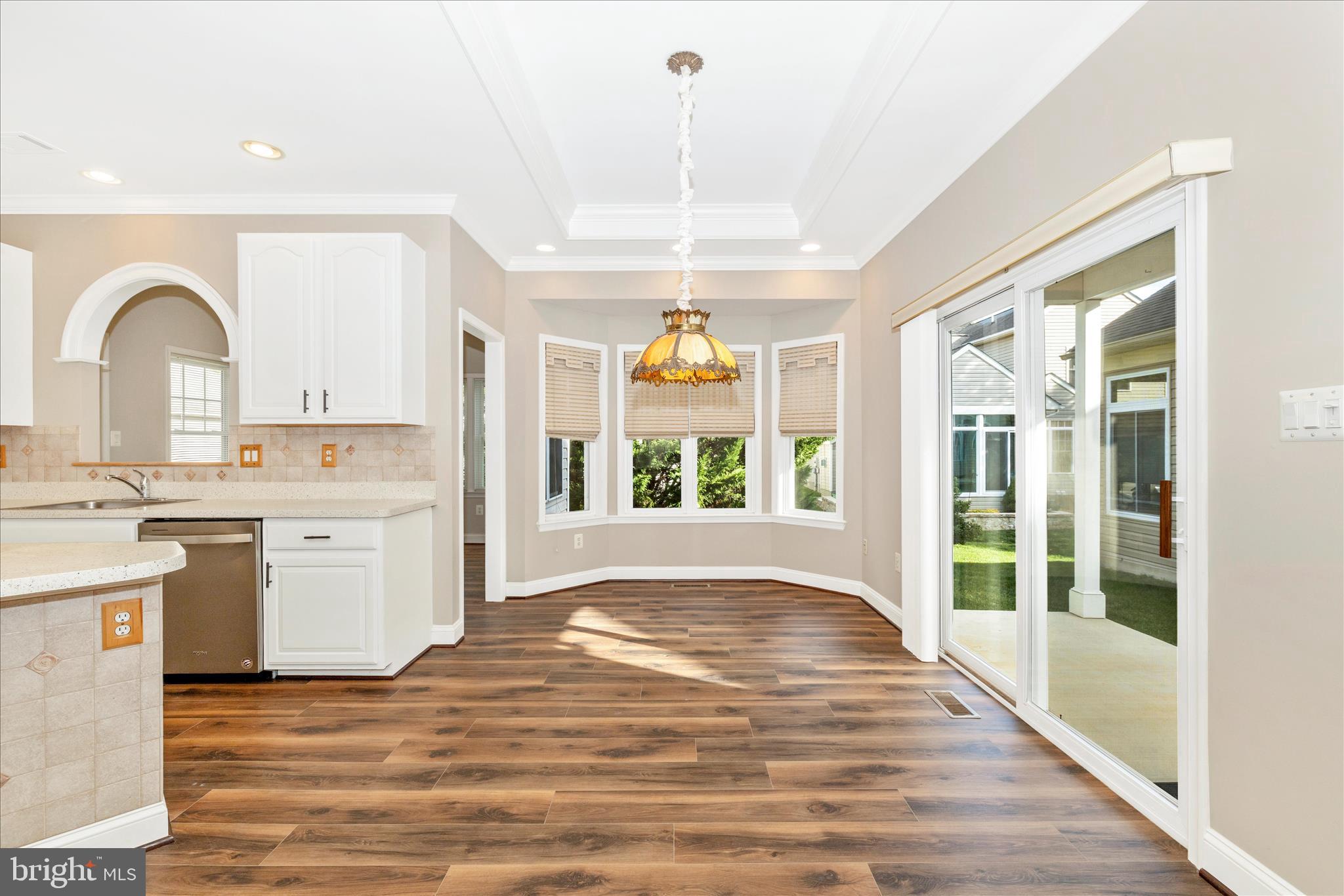 2654 Brook Valley Road Frederick, MD 21701 - Photo 16 of 64 a view of an empty room with window and wooden floor