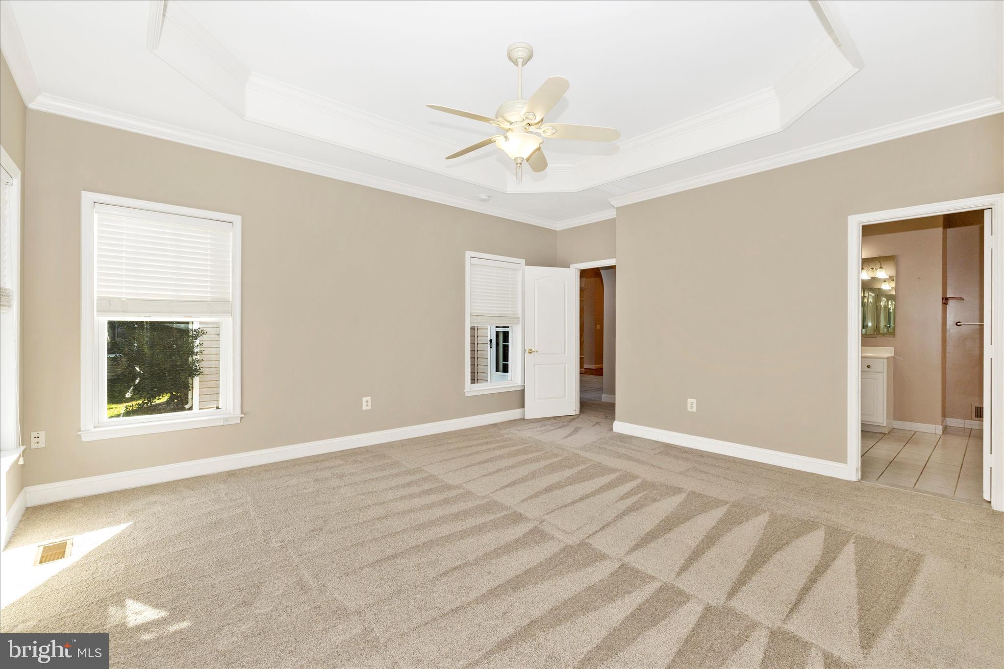 2654 Brook Valley Road Frederick, MD 21701 - Photo 26 of 64 a view of an empty room with window and a chandelier fan