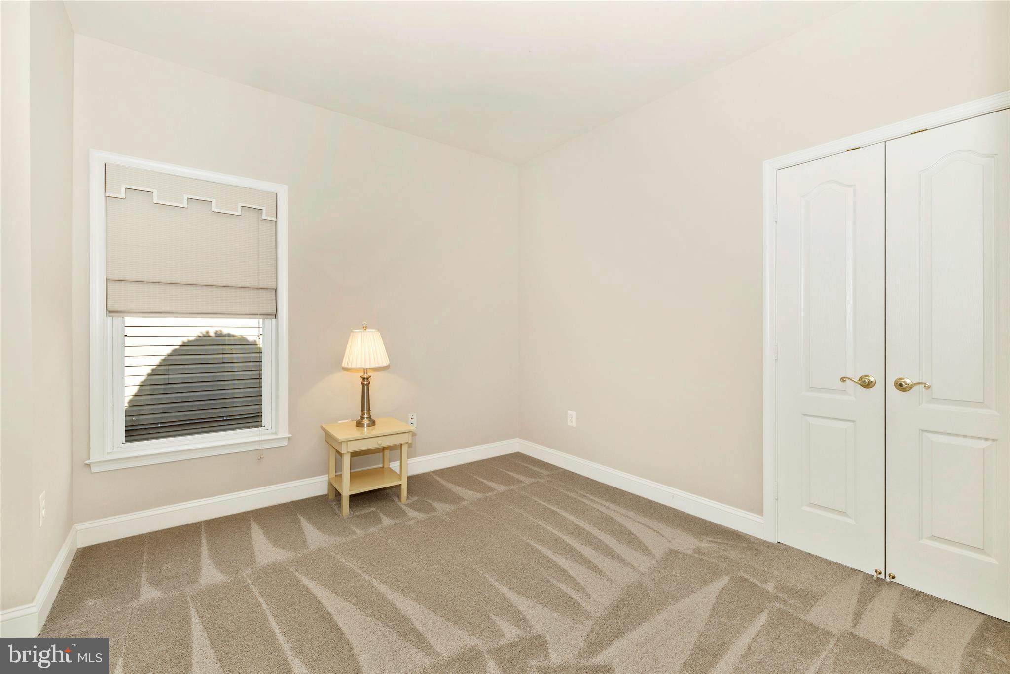 2654 Brook Valley Road Frederick, MD 21701 - Photo 33 of 64 a room with a window and a chair