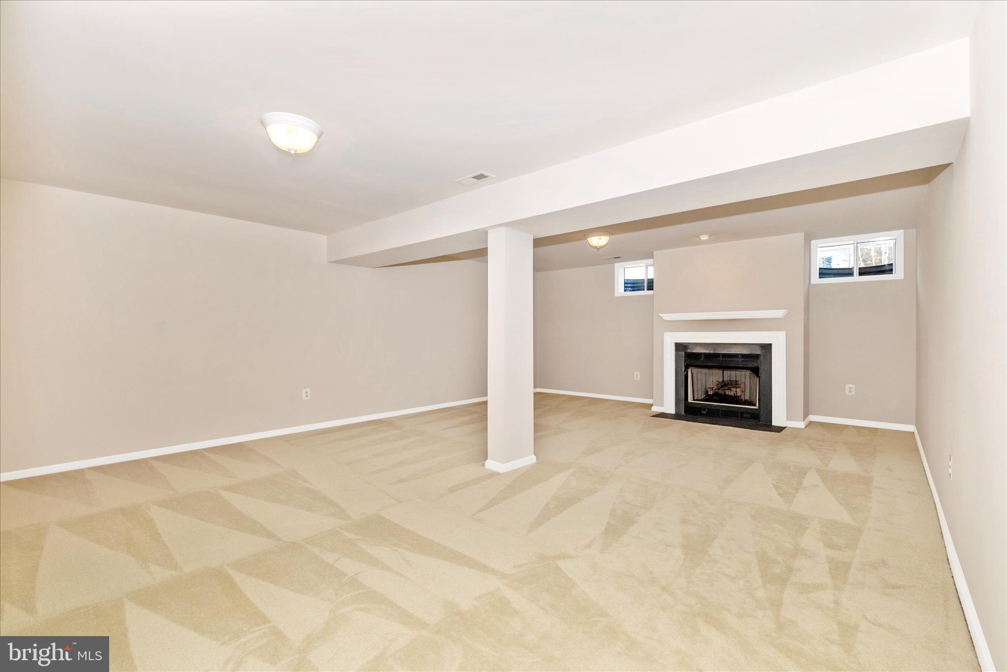 2654 Brook Valley Road Frederick, MD 21701 - Photo 38 of 64 an empty room with fireplace