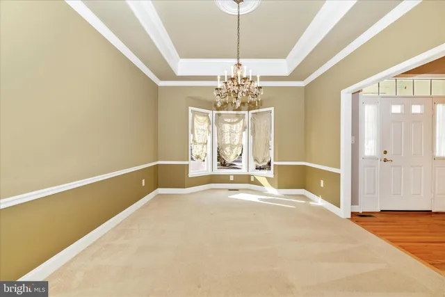 a view of a livingroom with a chandelier