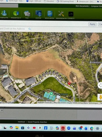 a view of swimming pool from a window