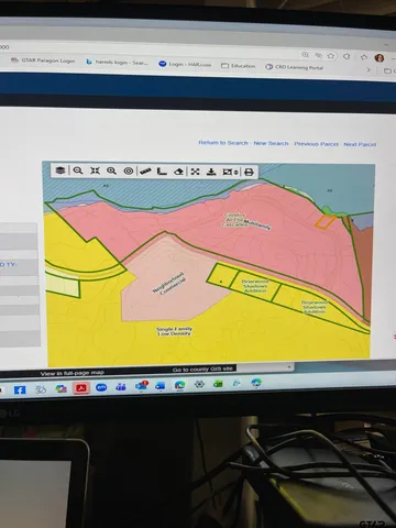 a view of swimming pool and outdoor seating