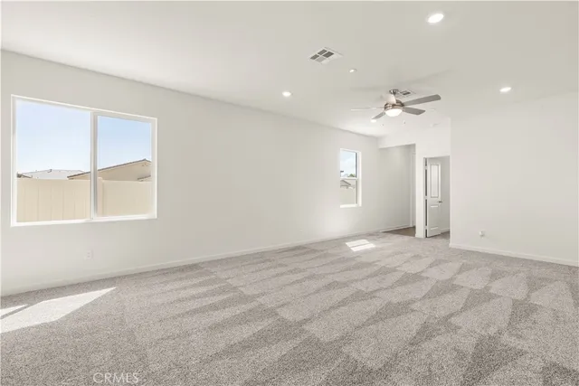 a kitchen with sink cabinets and stainless steel appliances
