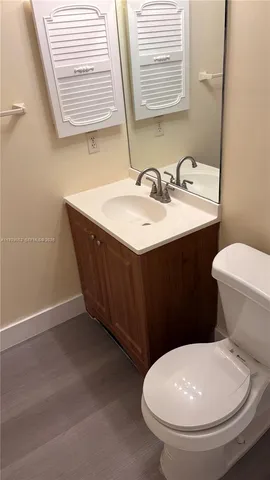 a bathroom with a sink and a toilet