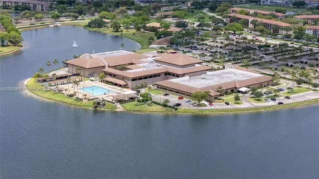a view of parking garage with cars