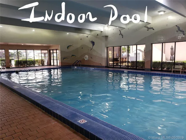 a view of a dining area with lots of tables and chairs