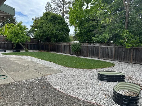 a view of a backyard with a slide