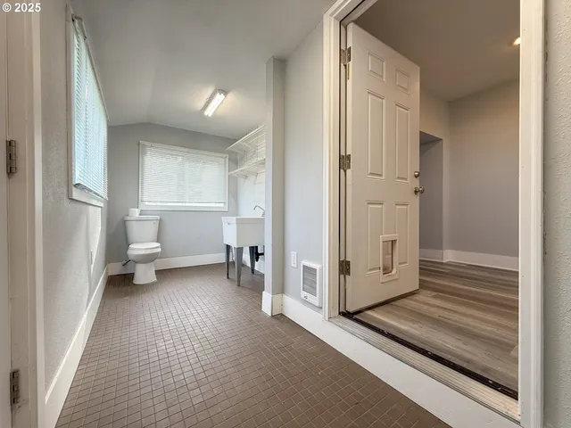 a view of utility room with closet