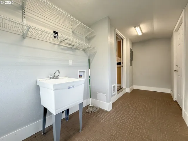 a view of a backyard of the house