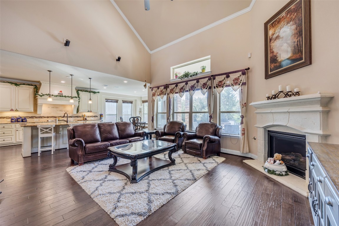 103 County Road 180, Unit 23 Leander, TX 78641 - Photo 17 of 40 a living room with furniture fireplace and wooden floor
