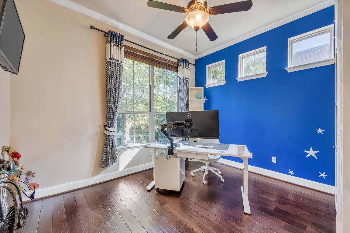 103 County Road 180, Unit 23 Leander, TX 78641 - Photo 2 of 40 a view of a workspace with furniture and a window
