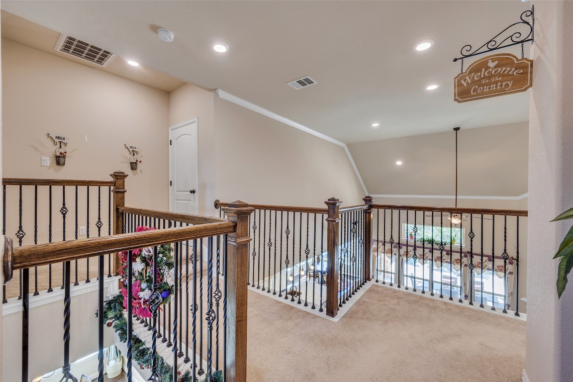 103 County Road 180, Unit 23 Leander, TX 78641 - Photo 25 of 40 a view of a hallway with wooden floor