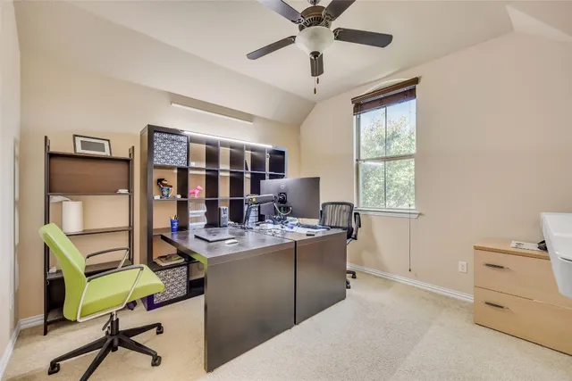 a bathroom with a granite countertop toilet sink and shower