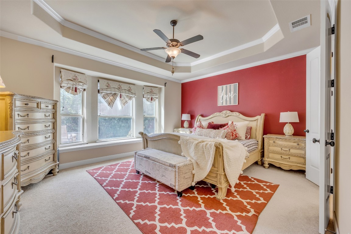 103 County Road 180, Unit 23 Leander, TX 78641 - Photo 29 of 40 a spacious bedroom with a bed and window