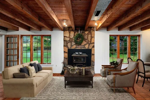 a kitchen with stainless steel appliances a stove sink and microwave