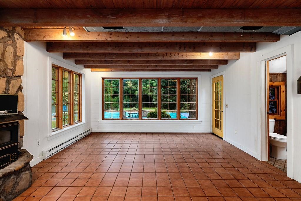 8787 Thorny Branch Road Bridgewater, VA 22812 - Photo 24 of 46 a view of empty room with wooden floor and fan