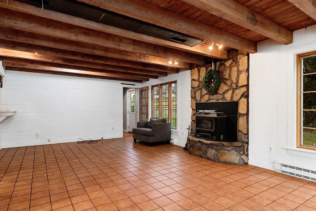 8787 Thorny Branch Road Bridgewater, VA 22812 - Photo 25 of 46 a living room with furniture and a fireplace